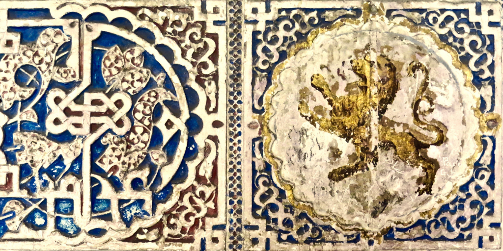 A result of convivencia: the lion of Spain’s coat of arms appears as part of Islamic-style wall decoration in the royal palace in Seville.